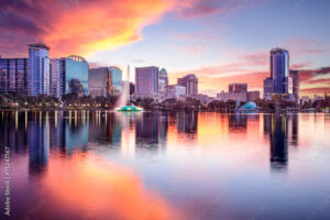 physiatry job opening in orlando with the sunset on the buildings and water
