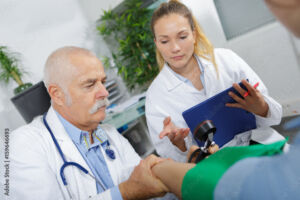 Physiatrist working with a physician's assistant
